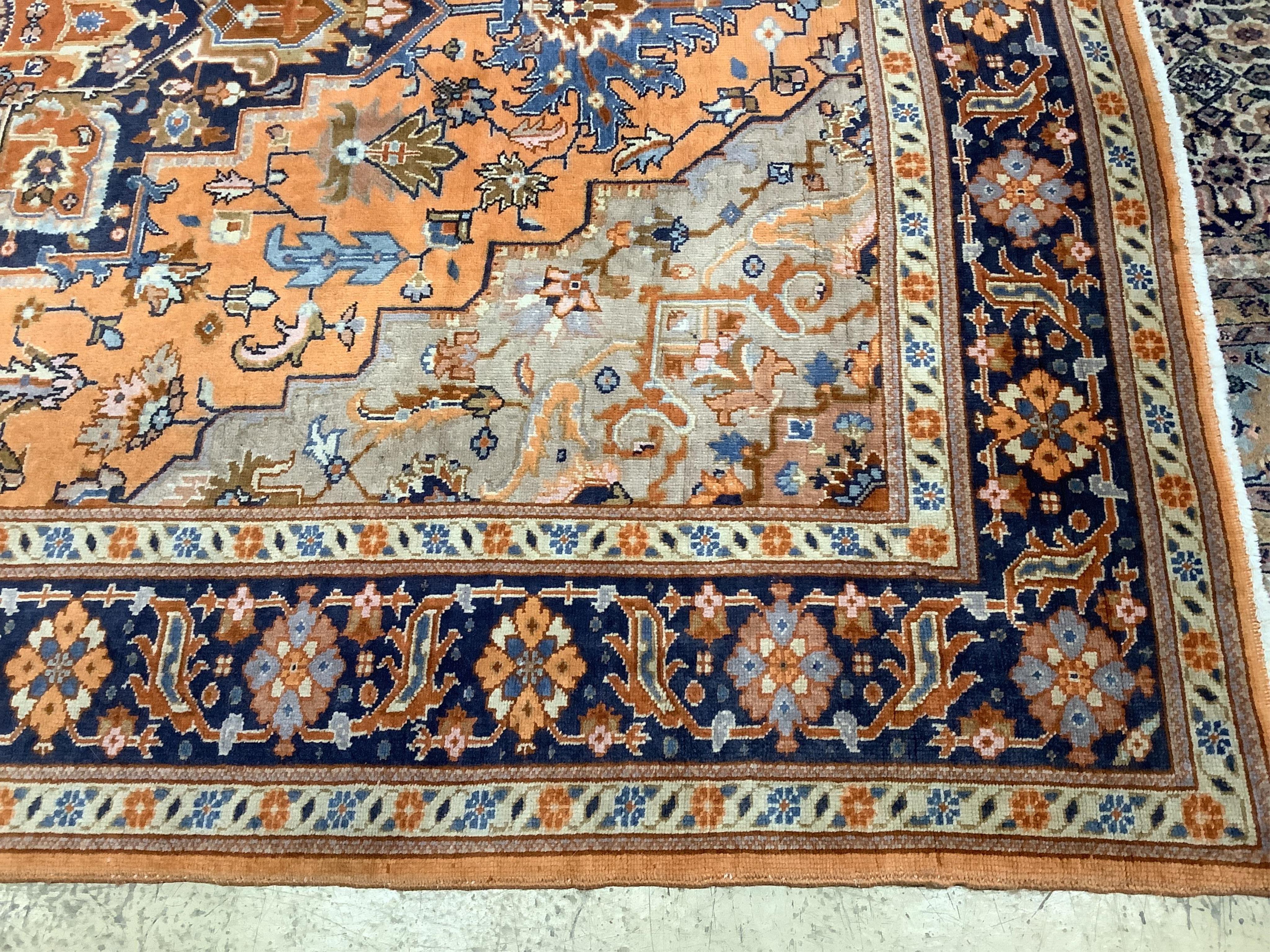 A North West Persian peach ground carpet, 270 x 204cm. Condition - fair